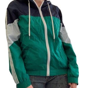Light colorful rain jacket, with color blocking and stripes on sleeves